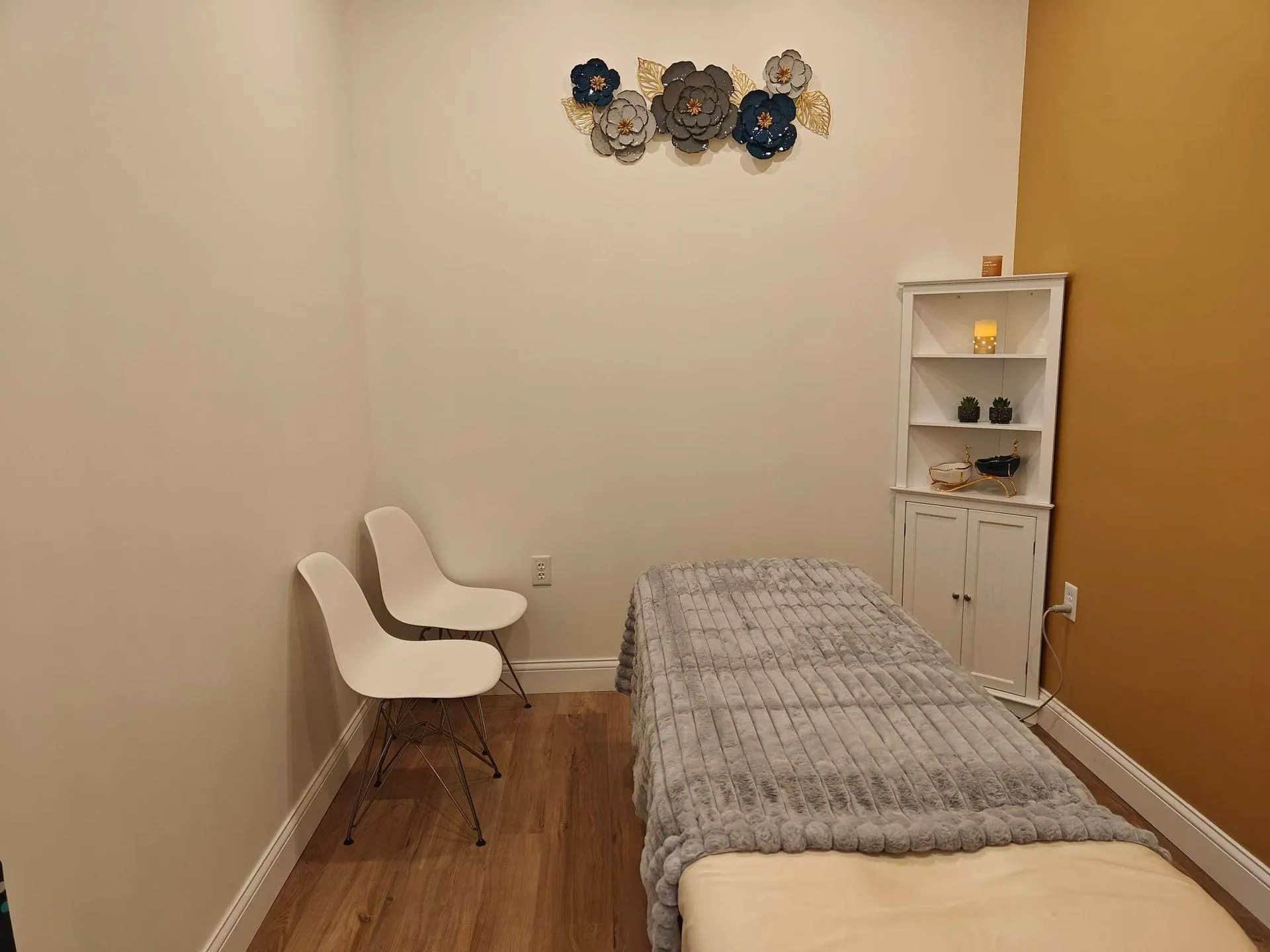 A treatment room at Fiona's Day Spa in Coon Rapids, MN, set up for a massage